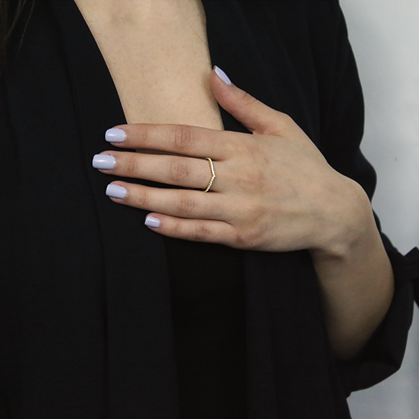 18kt Yellow Gold Plated Wedge Style Stackable Ring with Cubic Zirconia Worn by Woman