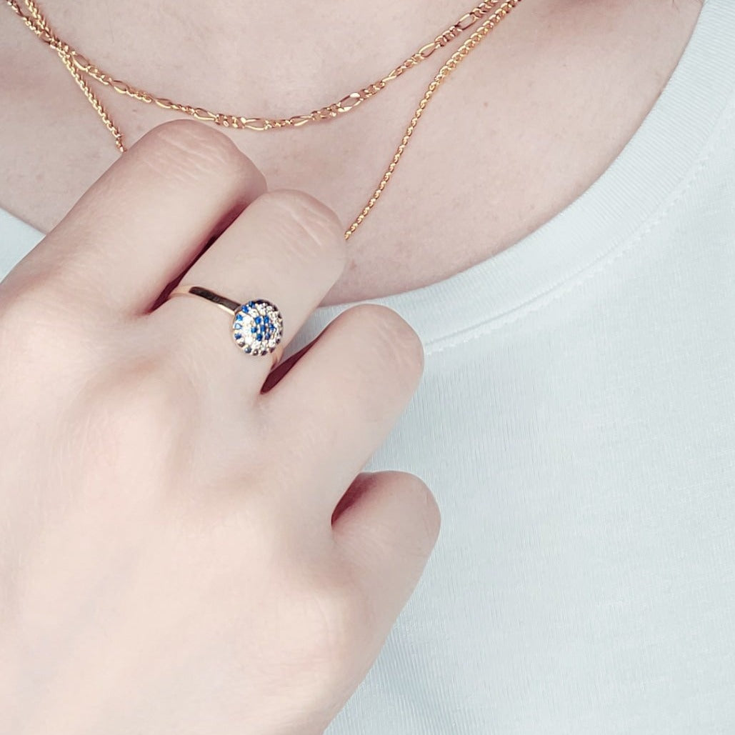 Woman wearing 10KT Gold sapphire ring