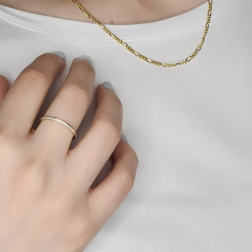 Wearing a 10KT Yellow gold crystal ring