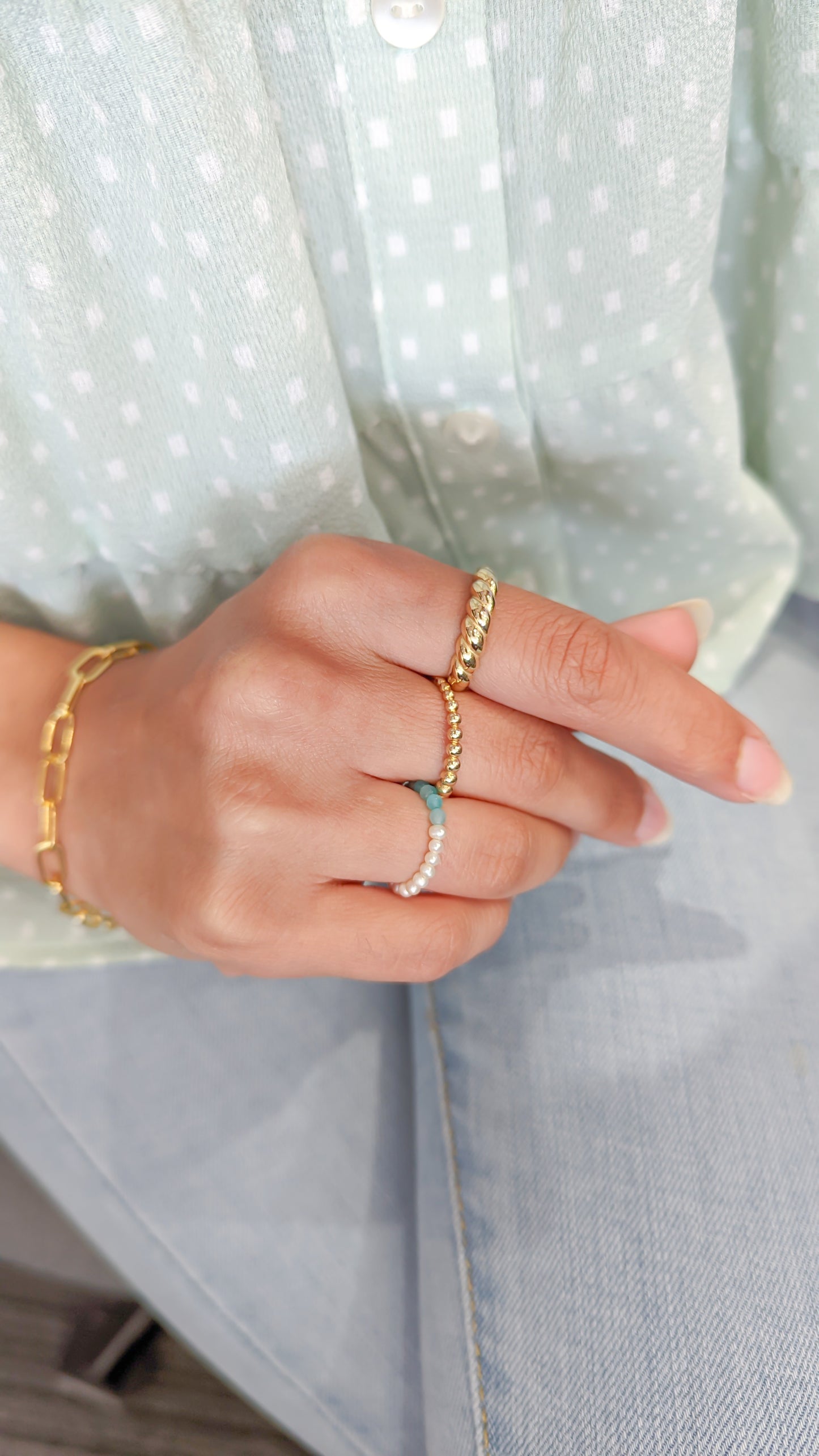 Woman wearing croissant ring