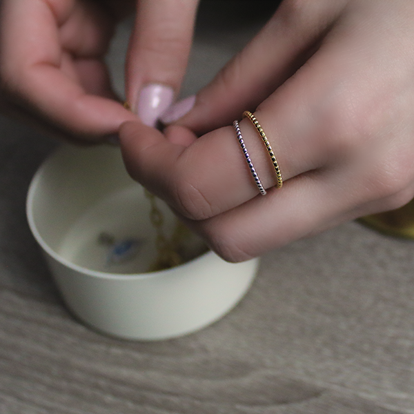 Sterling Silver and 18kt Yellow Gold Beaded Style Band Worn by Woman