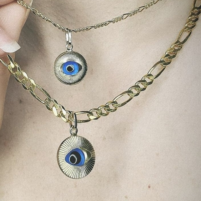 Woman wearing evil eye medallion