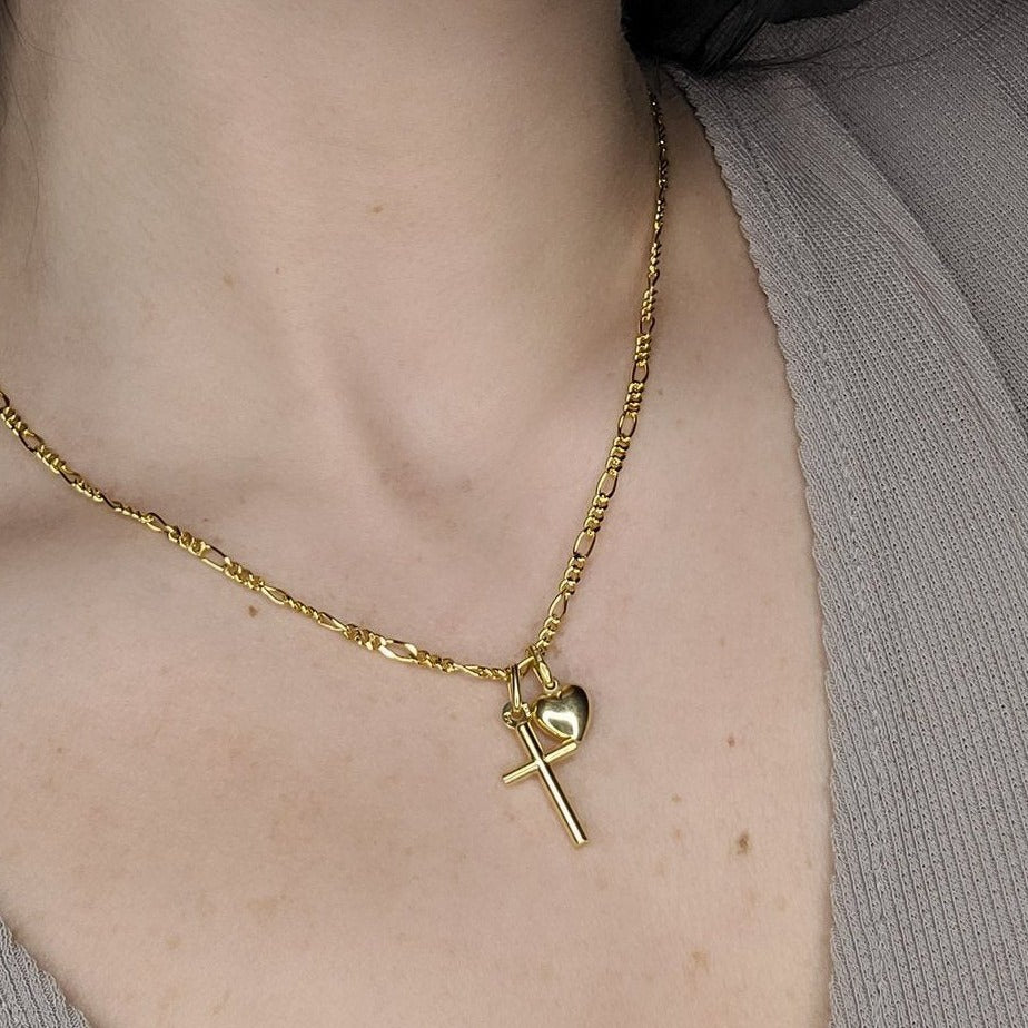 Woman wearing cross pendant 3