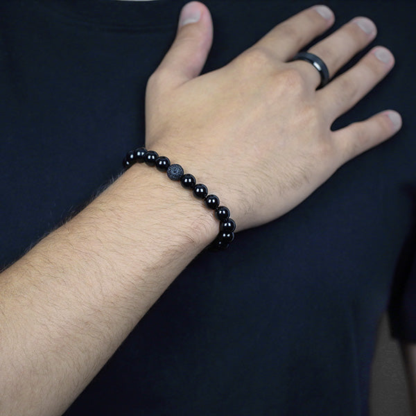 8mm Black Onyx and Black Lava Beaded Bracelet Worn by Man with Tungsten Carbide Ring
