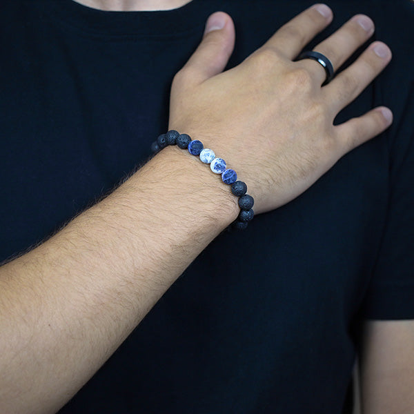 Sodalite and Black Lava Beaded Bracelet Worn by Man with Tungsten Carbide Ring