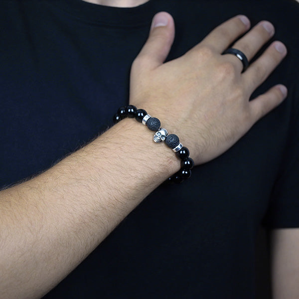 10mm Black Onyx Beaded Bracelet with Sterling Silver Spacer Beads and Skull Worn by Man with Black Tungsten Carbide Ring