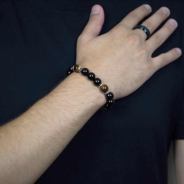 10mm Black Onyx Tiger Eye and Sterling Silver Spacer Beaded Bracelet Worn by Man with Black Tungsten Carbide Ring