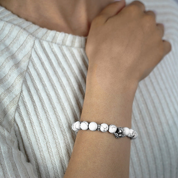 White Howlite Beaded Bracelet with Sterling Silver Elephant Charm Worn by Woman