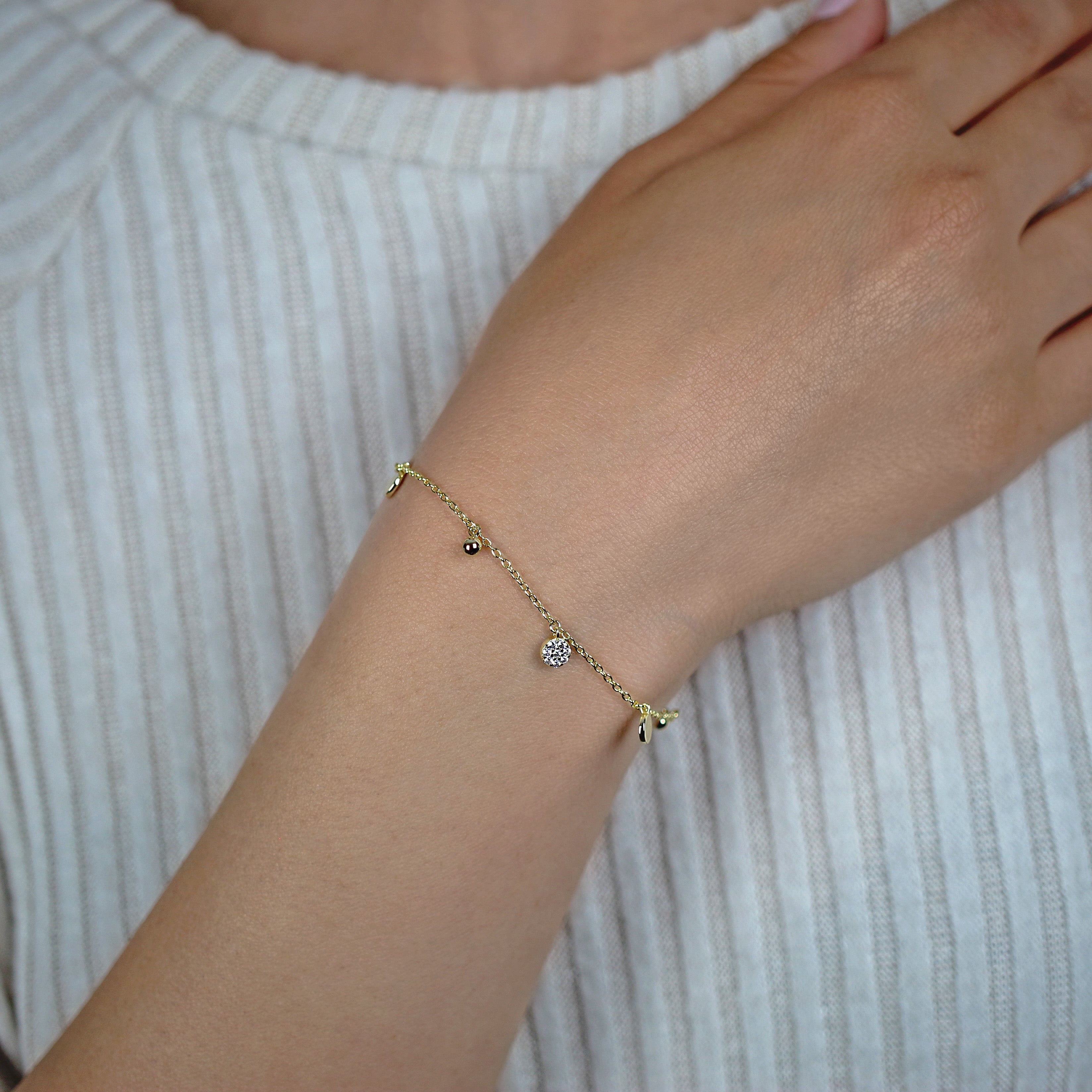 Sterling Silver 18kt Yellow Gold Plated Mais Oui Bracelet with Cubic Zirconia Worn by Woman