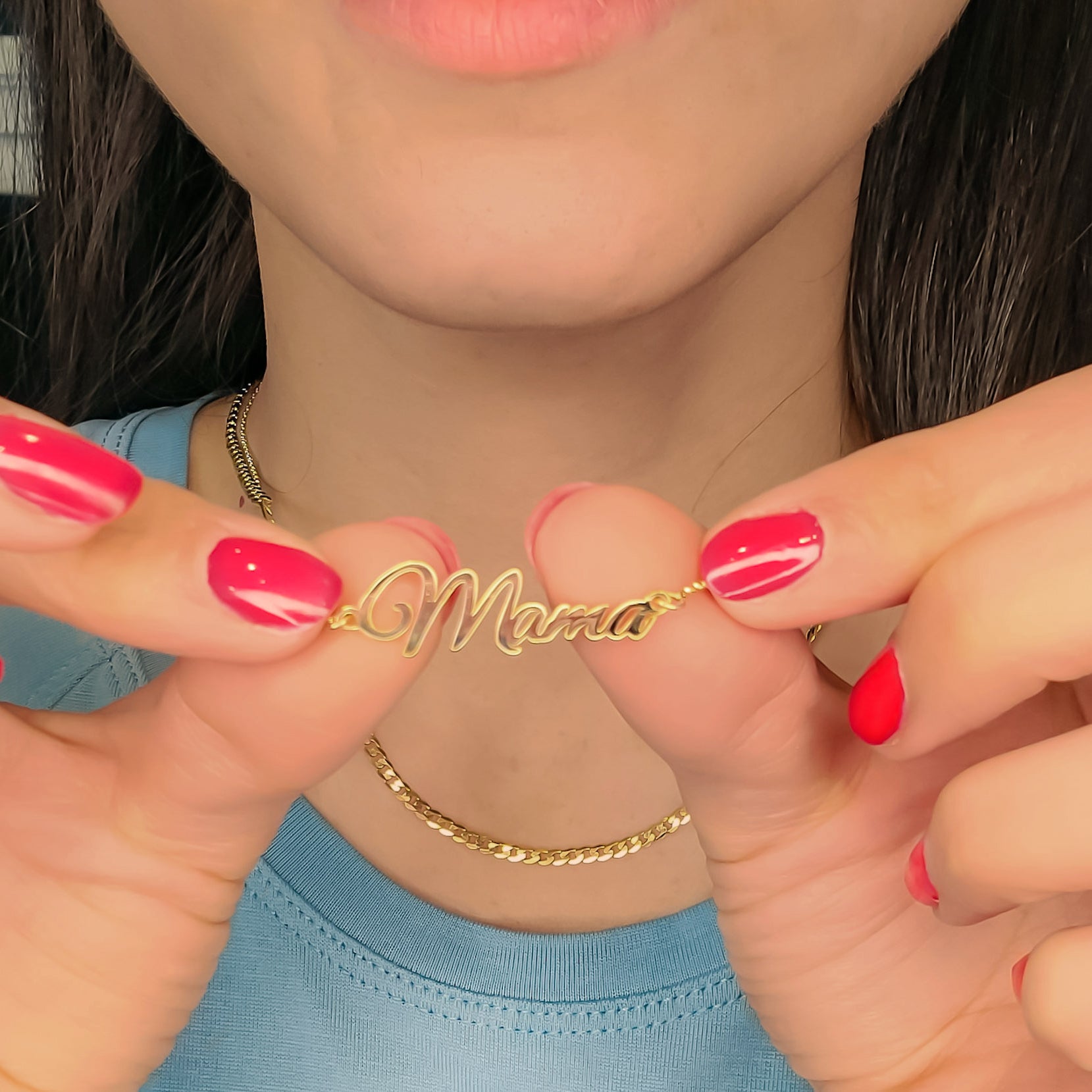 Model Holding 10KT Yellow Gold Mama Name Necklace Premium and Wearing 2.5mm Wide 10KT Yellow Gold Curb Chain