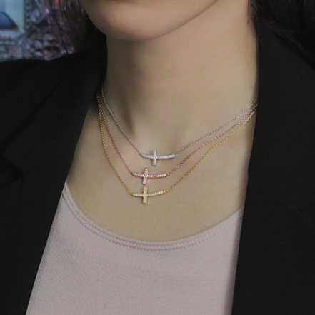 Sterling Silver Cubic Zirconia Horizontal Cross Necklace on Woman's Neck in Rose, Yellow and Silver 2