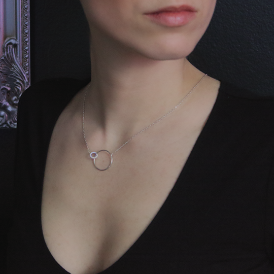 Sterling Silver Cubic Zirconia Ring and Large Ring Dual Necklace Around Woman's Neck