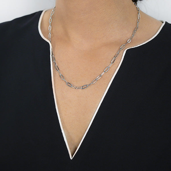 Sterling Silver Paper Clip Chain Worn by Woman