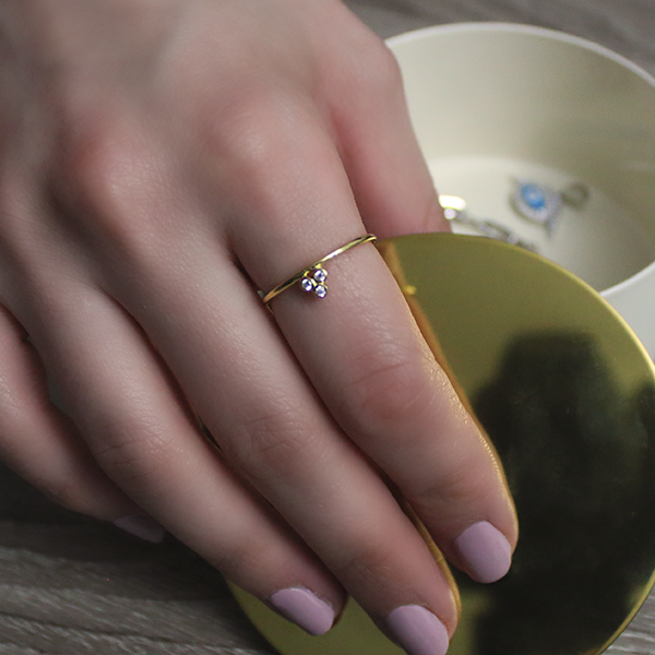 18kt Yellow Gold Plated Triple Cubic Zirconia Bezel Set Ring Worn by Woman 1