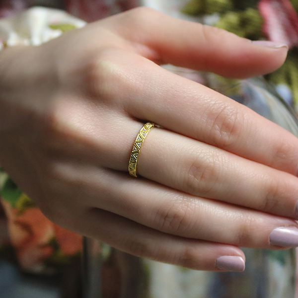 18kt Yellow Gold Plated Sequenced Triangles Ring with Cubic Zirconia Worn by Woman 1