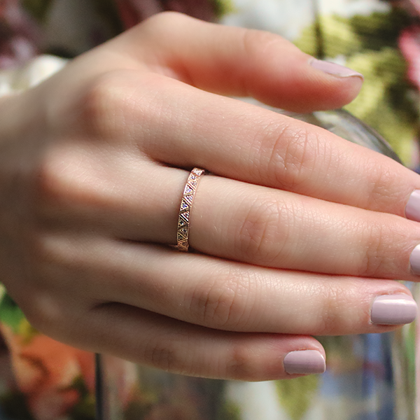 18kt Rose Gold Plated Sequenced Triangles Ring with Cubic Zirconia Worn by Woman 1