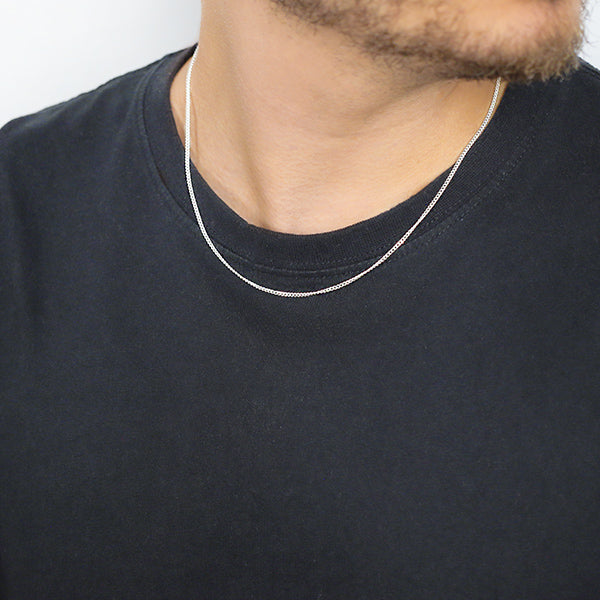 2mm Sterling Silver Curb Style Chain with Spring Ring Worn by Man