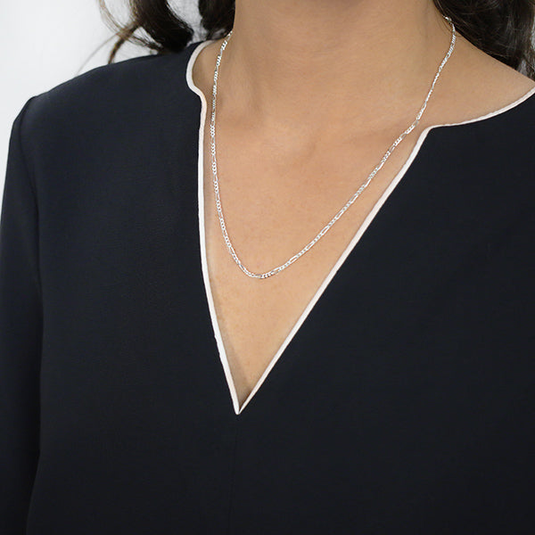 2mm Sterling Silver Figaro Style Chain Worn by Woman