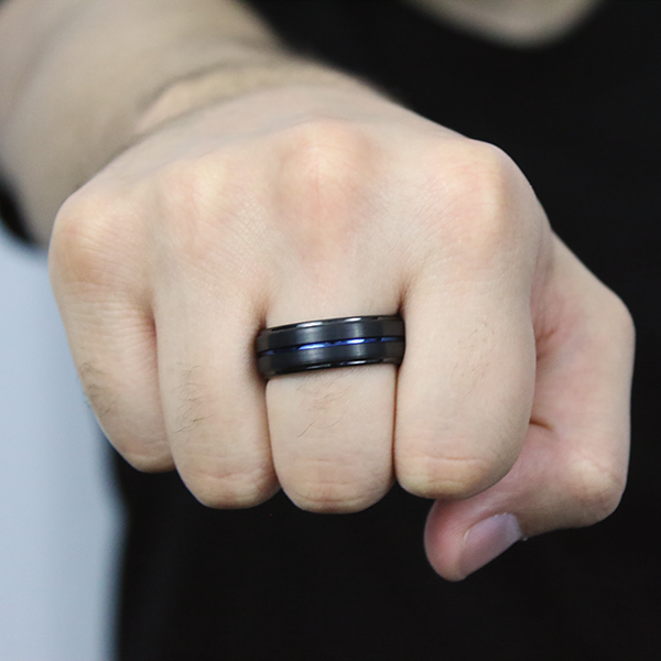 Step Edged Satin Finished Black and Blue Plated Tungsten Carbide Ring worn by a man 2