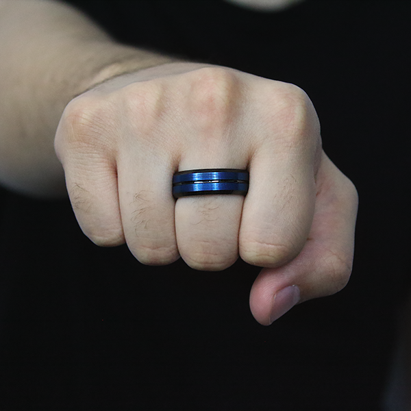 Black and Blue Plated Beveled Edge Sating Finished Tungsten Carbide Ring worn by a man 2